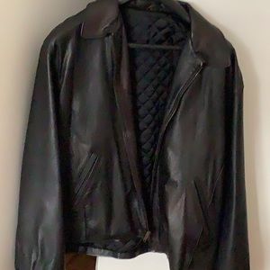 This is a waist length leather jacket, size large. Lined. Very good shape